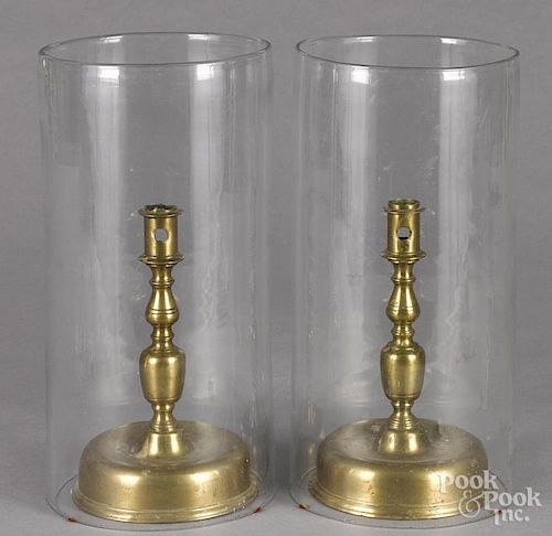 Pair of Spanish bell base brass candlesticks, 17th c., 9 1/4'' h.