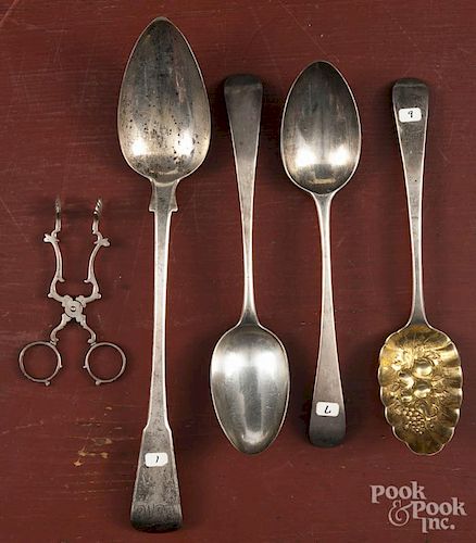 Three Georgian silver stuffing spoons, 18th c., together with a berry spoon and sugar tongs