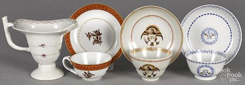 Three Chinese export porcelain cups and saucers, 19th c., one with eagle decoration