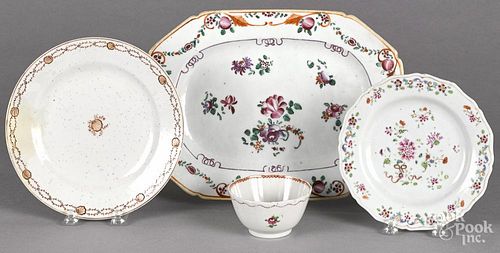 Chinese export porcelain platter, 19th c., 8 1/4'' l., 11 1/4'' w., together with two plates and a cup