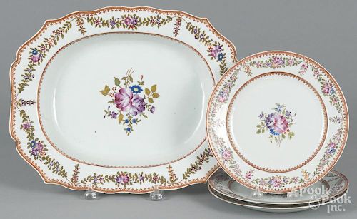 Three Chinese porcelain plates, late 18th c., 9'' dia., together with a matching platter, 12'' l.
