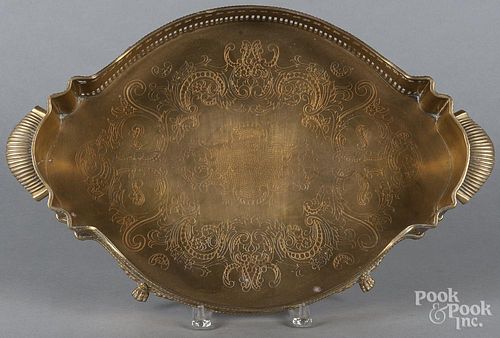 Engraved brass tray, 20th c., 4'' l., 20'' w.