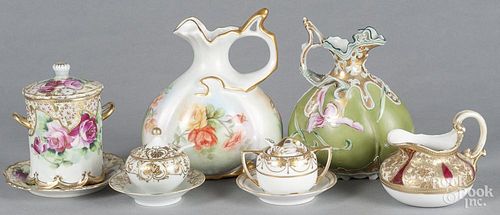 Two hand-painted porcelain pitchers, together with a group of Nippon, tallest - 8''.