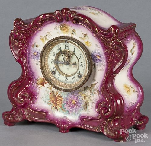 Ansonia mantel clock with a Royal Bonn porcelain case, 12'' h.