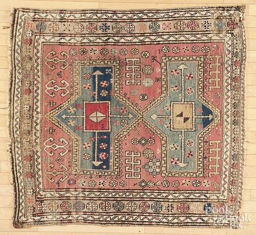 Kazak carpet, early 20th c., 4'4'' x 4'.