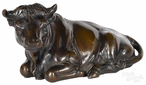 Patinated bronze bull, 20th c., 7 3/4'' h., 16'' w.