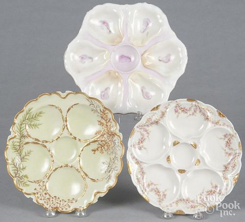 Three porcelain oyster plates, ca. 1900.