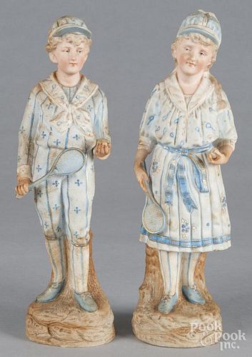 Pair of bisque figures of a boy and girl, 12 3/4'' h.