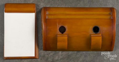 Carvacraft art deco amber Bakelite desk set, 20th c., to include a note pad holder and a pen holder