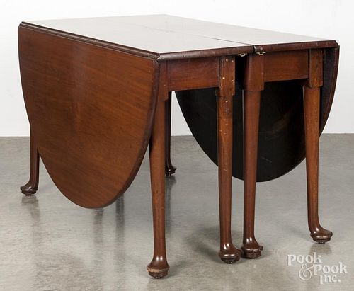 George II mahogany drop leaf dining table, ca. 1760, altered to be a two-part extension table