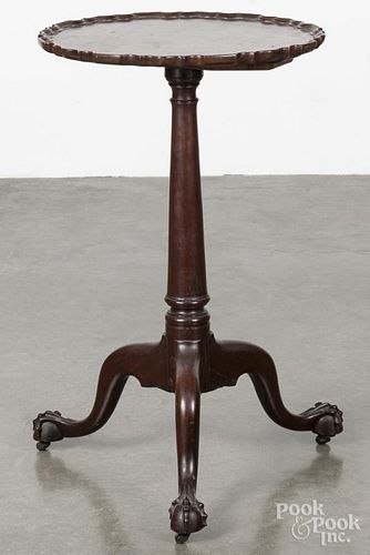 George III mahogany candlestand, ca. 1770, with a piecrust top and ball and claw feet, 27 1/4'' h.