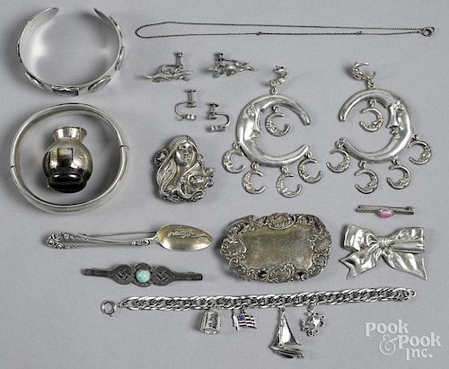 Assorted sterling silver jewelry, to include a souvenir cuff, a bangle, a charm bracelet