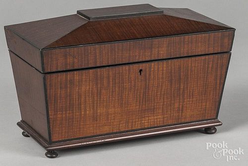 Regency mahogany tea caddy, early 19th c., with a fitted interior, 7 1/2'' h., 11 3/4'' w.