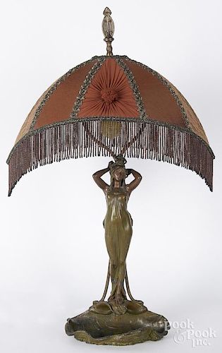 Bronzed spelter art nouveau table lamp, early 20th c., with an octopus and shell base