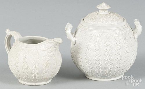 J. Dudley Hanley Argyle, salt glaze teapot, 5'' h., and creamer, 3'' h.