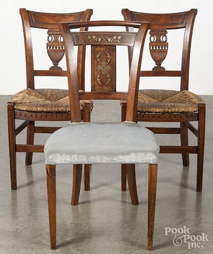 Pair of Directoire rush seat dining chairs, together with a single chair with a brass inlaid back.