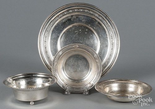 Four sterling silver small plates and bowls, 17.6 ozt.