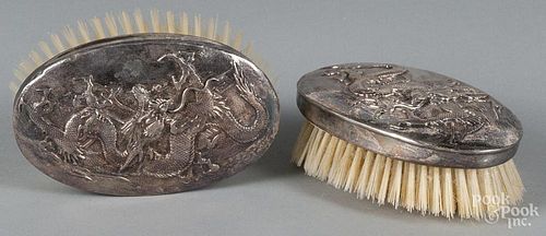 Two Japanese silver mounted brushes, signed Musashiya, 5 1/4'' l.