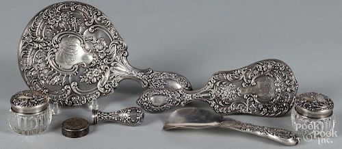 Seven-piece sterling silver mounted dresser set.