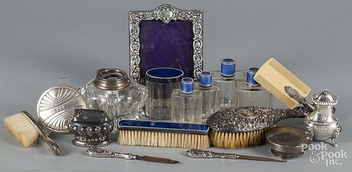 Sterling silver mounted dresser accessories.
