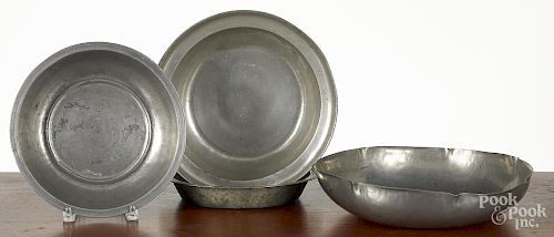 Three pewter basins, 19th c., largest - 13'' dia., together with a large shaped bowl
