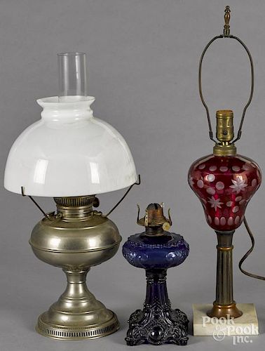 Rayo lamp, ca. 1900, overall - 21'' h., together with a cranberry cut to clear table lamp