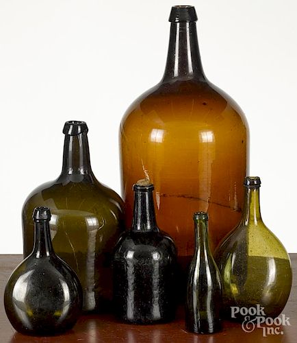 Six blown bottles, 19th c., tallest - 19 1/2''.