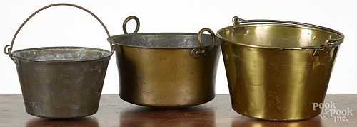 Two Connecticut brass buckets, late 19th c., together with a dovetailed copper pot, tallest - 9''.
