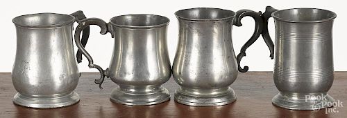 Four pewter mugs, 19th c., one inscribed A. W. McKenzie, tallest - 5 1/4''.