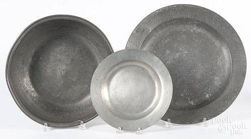 English pewter charger, 19th c., 15'' dia., together with a basin and a plate.