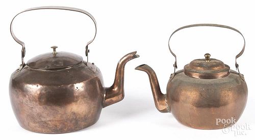 Pennsylvania dovetailed copper kettle, 19th c., 10 1/2'' h., together with another kettle, 9 1/2'' h.