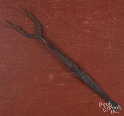 Wrought iron long-handled fork, 19th c., stamped J. V. Lovett, 15'' l.
