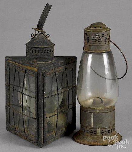 Tin carry lantern, 19th c., 13'' h., together with another tin lantern, 15'' h.