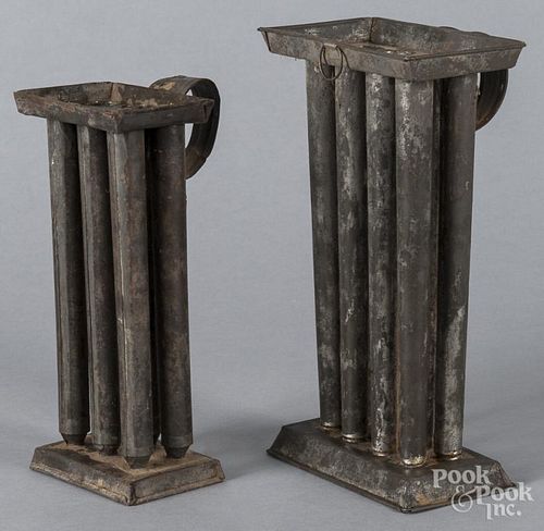 Two tin candlemolds, 19th c., 9 1/2'' h. and 11'' h.