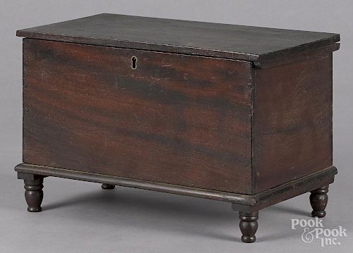 Miniature mahogany blanket chest, 19th c., 10'' h., 14 1/4'' w.