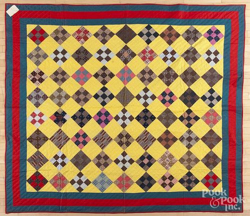 Pennsylvania nine-patch quilt, late 19th c., with a triple border, 78'' x 88''.