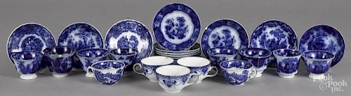 Flow blue cups and saucers, 19th c., of various patterns, to include Shapoo, Scinde, etc.
