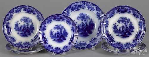 Scinde pattern flow blue, 19th c., to include a soup bowl, 10 1/2'' dia., and five plates.