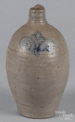 Stoneware jug, 19th c., with cobalt floral scroll decoration, 10'' h.