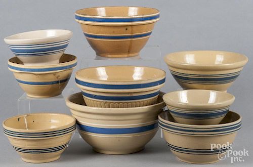 Nine yelloware mixing bowls, ca. 1900, largest - 6 1/4'' h., 12 1/2'' dia.