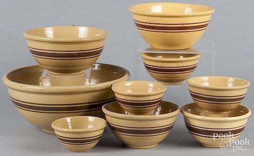 Assembled set of nine yelloware mixing bowls, ca. 1900, largest - 7'' h., 16'' dia.