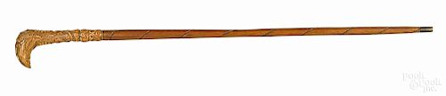 Carved sirocco wood cane, 20th c., 34 1/2'' l.
