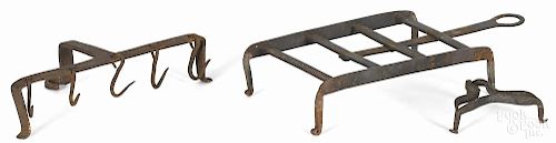 Wrought iron skewer rack, 19th c., 9 1/2'' w., together with two iron trivets.