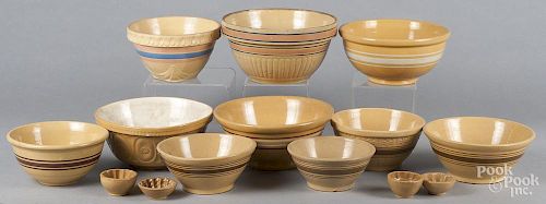 Ten yelloware mixing bowls, ca. 1900, largest - 5 1/2'' h., 10 1/2'' dia.