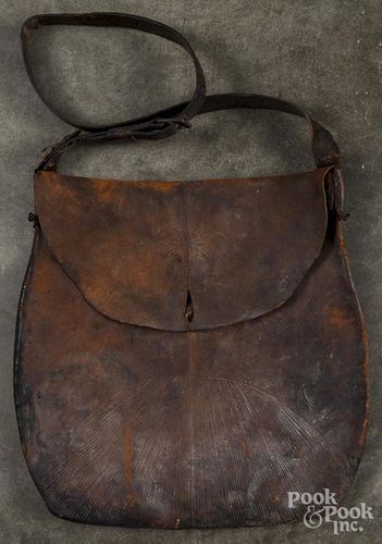 Tooled leather hunting bag, 19th c., with a horse button, 14'' h., 15'' w.