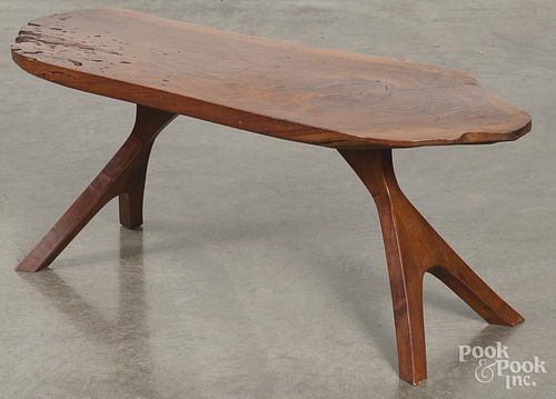 Modern walnut slab coffee table, mid 20th c., initialed TK, 15'' h., 37 1/2'' w.