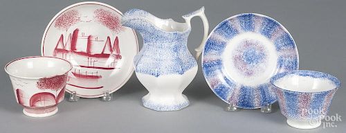 Three pieces of spatterware, 19th c., to include a blue cream pitcher, 5 3/4'' h.