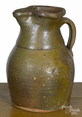 Pennsylvania or Maryland redware pitcher, 19th c., with green and brown glaze, 9 3/4'' h.