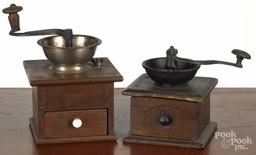 Two Pennsylvania poplar coffee mills, 19th c., one handle stamped Adams, 9'' h. and 6'' h.
