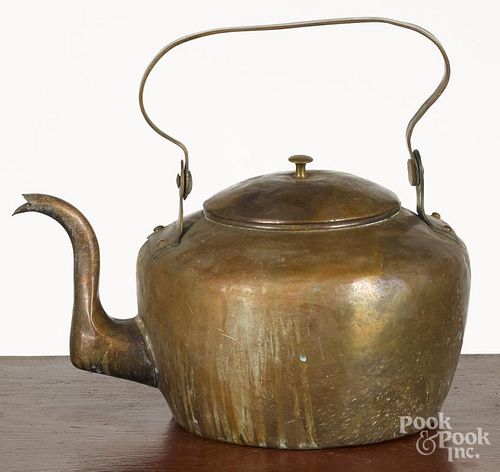 American copper tea kettle, 19th c., with a swing handle, 11'' h.